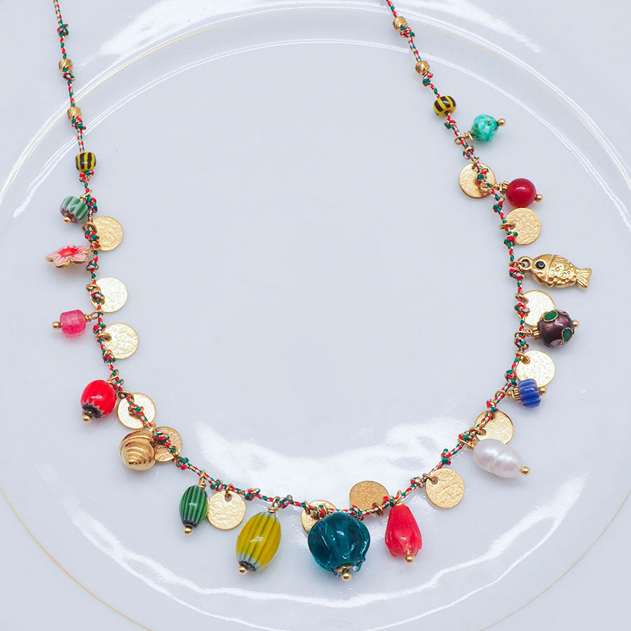 COLLIER CAMARINAS - CHARMS PASTILLES DOREES ET GRIGRIS MARINS SUR CORDON