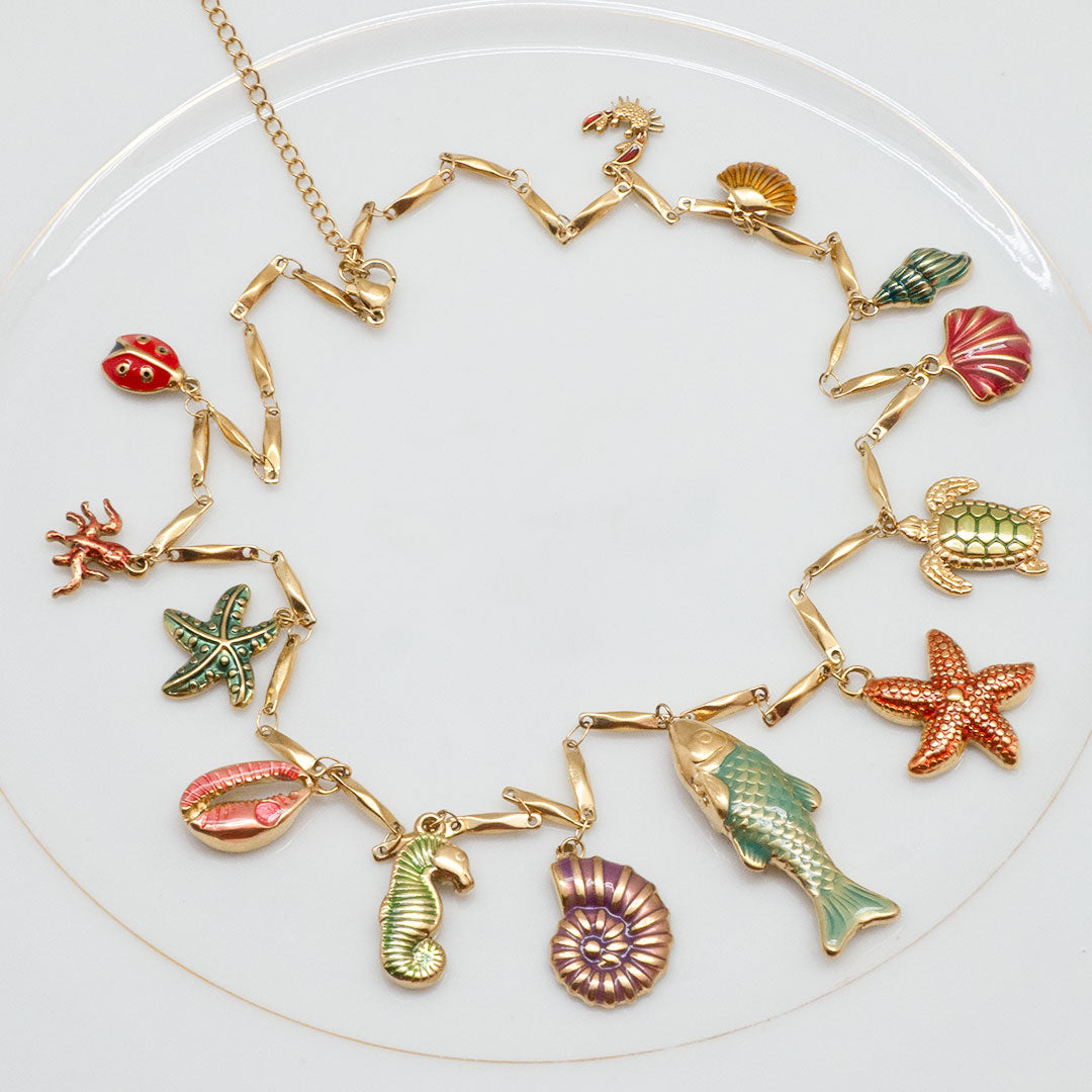 COLLIER PLAYA SANTA BAIA - CHAÎNE BAGUETTE ET CHARMS AQUATIQUES